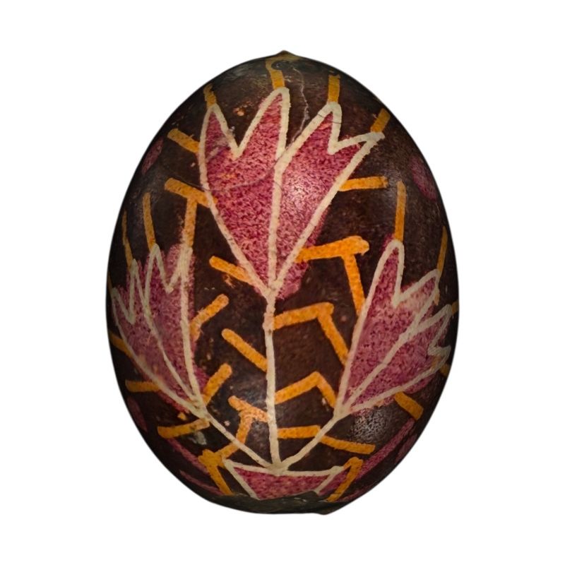 A pysanka with a floral design. Late 19th century.The menu features audio description and videos translated into USL